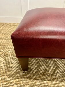 Delcor-bespoke-luxury-footstool-meticulously handcrafted in Britain-choose from over 10,000 fabrics-including velvets-leathers-vast array of patterned and plain materials-available in a broad spectrum of colours-including grey-cream-blue-purple-red-green-and more-each piece showcases timeless design and comfort.