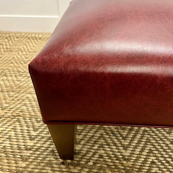 Delcor-bespoke-luxury-footstool-meticulously handcrafted in Britain-choose from over 10,000 fabrics-including velvets-leathers-vast array of patterned and plain materials-available in a broad spectrum of colours-including grey-cream-blue-purple-red-green-and more-each piece showcases timeless design and comfort.