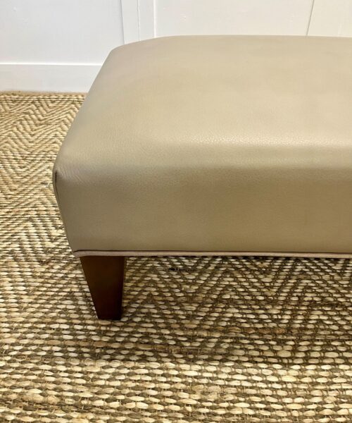 Delcor-bespoke-luxury-footstool-meticulously handcrafted in Britain-choose from over 10,000 fabrics-including velvets-leathers-vast array of patterned and plain materials-available in a broad spectrum of colours-including grey-cream-blue-purple-red-green-and more-each piece showcases timeless design and comfort.
