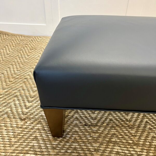 Delcor-bespoke-luxury-footstool-meticulously handcrafted in Britain-choose from over 10,000 fabrics-including velvets-leathers-vast array of patterned and plain materials-available in a broad spectrum of colours-including grey-cream-blue-purple-red-green-and more-each piece showcases timeless design and comfort.