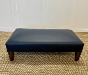 Delcor-bespoke-luxury-footstool-meticulously handcrafted in Britain-choose from over 10,000 fabrics-including velvets-leathers-vast array of patterned and plain materials-available in a broad spectrum of colours-including grey-cream-blue-purple-red-green-and more-each piece showcases timeless design and comfort.