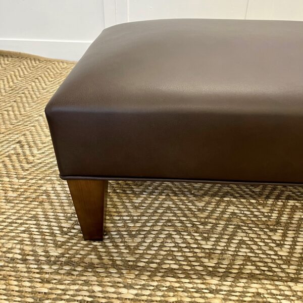 Delcor-bespoke-luxury-footstool-meticulously handcrafted in Britain-choose from over 10,000 fabrics-including velvets-leathers-vast array of patterned and plain materials-available in a broad spectrum of colours-including grey-cream-blue-purple-red-green-and more-each piece showcases timeless design and comfort.