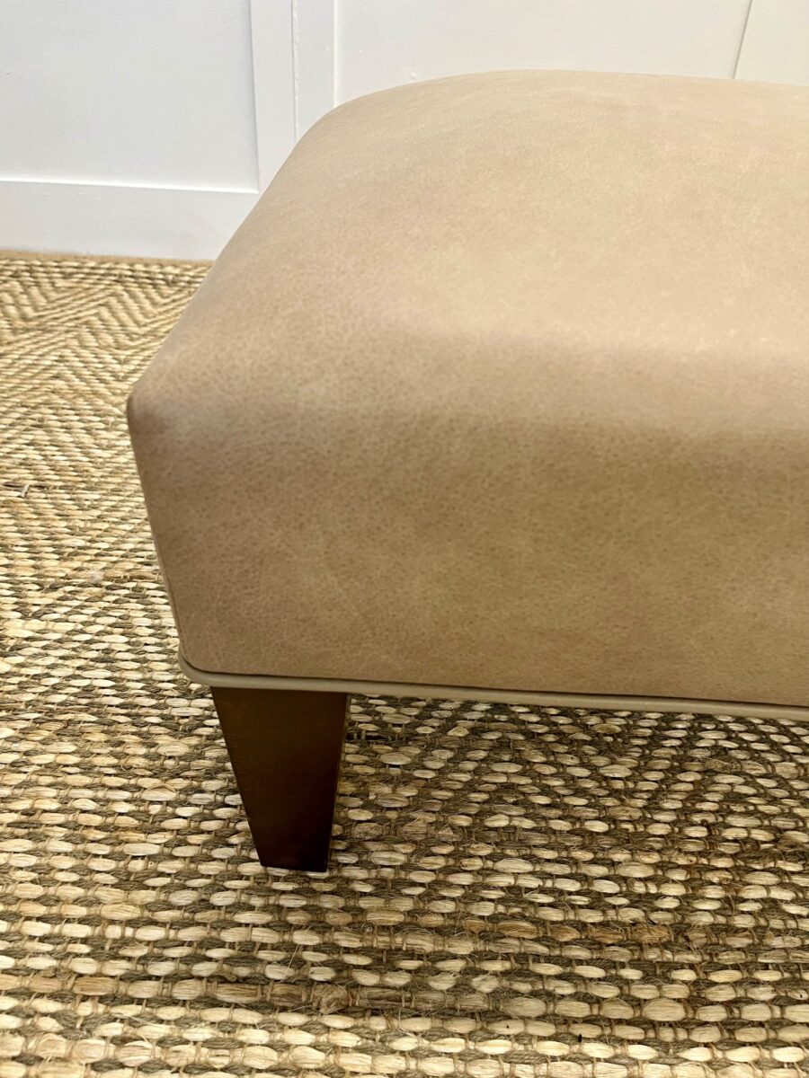 Delcor-bespoke-luxury-footstool-meticulously handcrafted in Britain-choose from over 10,000 fabrics-including velvets-leathers-vast array of patterned and plain materials-available in a broad spectrum of colours-including grey-cream-blue-purple-red-green-and more-each piece showcases timeless design and comfort.