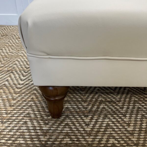 Delcor-bespoke-luxury-footstool-meticulously handcrafted in Britain-choose from over 10,000 fabrics-including velvets-leathers-vast array of patterned and plain materials-available in a broad spectrum of colours-including grey-cream-blue-purple-red-green-and more-each piece showcases timeless design and comfort.