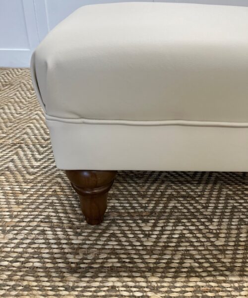 Delcor-bespoke-luxury-footstool-meticulously handcrafted in Britain-choose from over 10,000 fabrics-including velvets-leathers-vast array of patterned and plain materials-available in a broad spectrum of colours-including grey-cream-blue-purple-red-green-and more-each piece showcases timeless design and comfort.