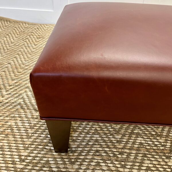 Delcor-bespoke-luxury-footstool-meticulously handcrafted in Britain-choose from over 10,000 fabrics-including velvets-leathers-vast array of patterned and plain materials-available in a broad spectrum of colours-including grey-cream-blue-purple-red-green-and more-each piece showcases timeless design and comfort.