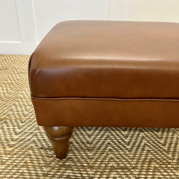 Delcor-bespoke-luxury-footstool-meticulously handcrafted in Britain-choose from over 10,000 fabrics-including velvets-leathers-vast array of patterned and plain materials-available in a broad spectrum of colours-including grey-cream-blue-purple-red-green-and more-each piece showcases timeless design and comfort.