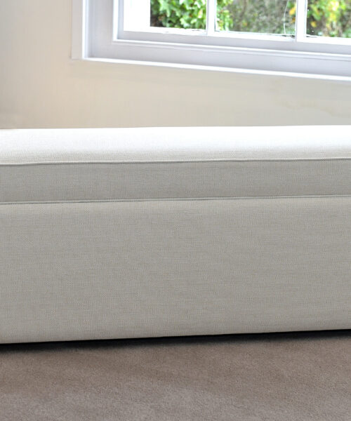 Delcor-bespoke-luxury-footstool-meticulously handcrafted in Britain-choose from over 10,000 fabrics-including velvets-leathers-vast array of patterned and plain materials-available in a broad spectrum of colours-including grey-cream-blue-purple-red-green-and more-each piece showcases timeless design and comfort.